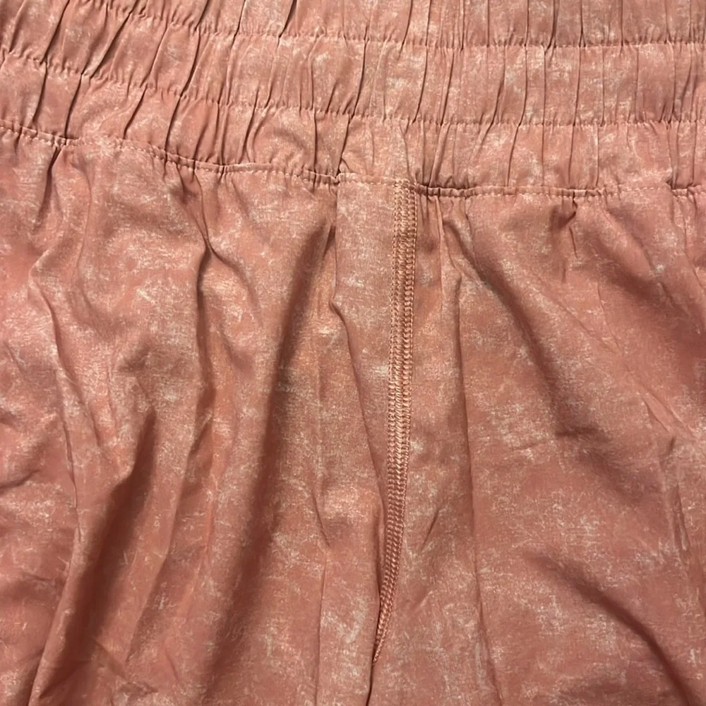 lululemon athletica Coral Peachy Color mid rise 5in Track That Shorts